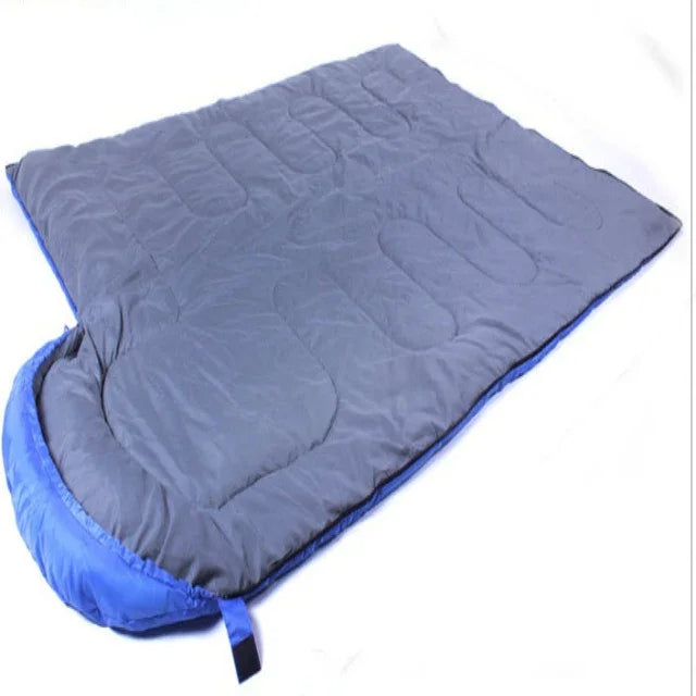Double-size grey and blue sleeping bag for camping or outdoor gear