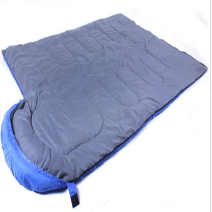 Double-size grey and blue sleeping bag for camping or outdoor gear
