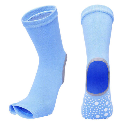 Light blue ankle socks with a sole pad and white polka dots on a white background