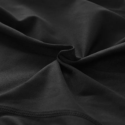 Close-up of black stretch fabric with detailed texture and seam, ideal for fitness apparel