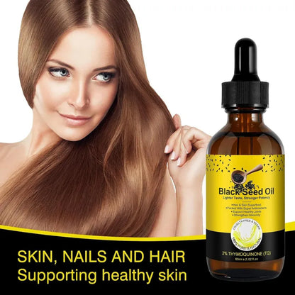 Woman with long brown hair holding a bottle of Black Seed Oil with text about skin, nails, and hair health.