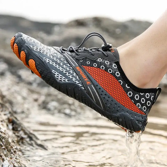 Lightweight water shoe with orange and black mesh, ideal for outdoor fitness activities