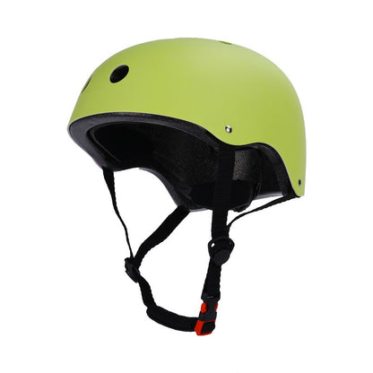 Green helmet with black straps on a white background