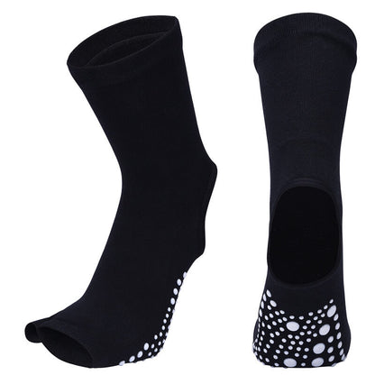 Black socks with white dot patterns on a white background