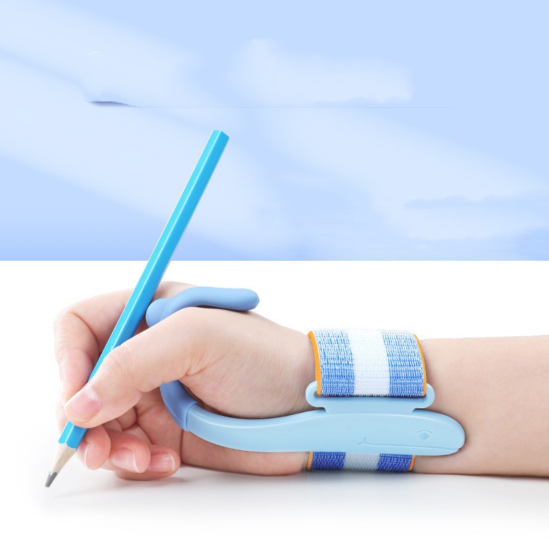 Hand with blue wristband holding a pencil against a light blue background