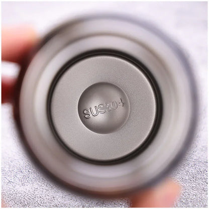 Close-up of SUS304 stainless steel tumbler interior, durable fitness drinkware