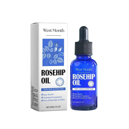 Blue glass dropper bottle and box of rosehip oil for skincare, labeled easy absorb and nourishing.
