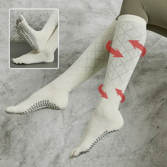 Compression socks with non-slip soles and geometric pattern on legs, exercise support