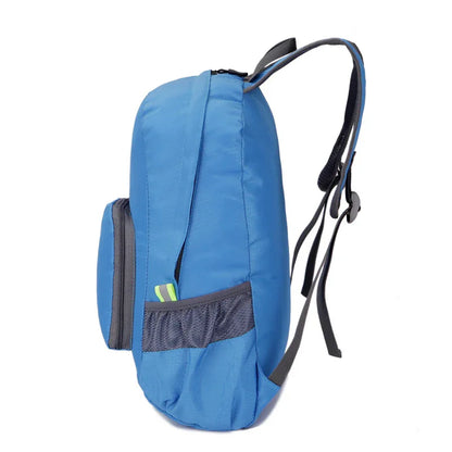 Blue fitness backpack with black straps, mesh side pocket, and front zip pocket
