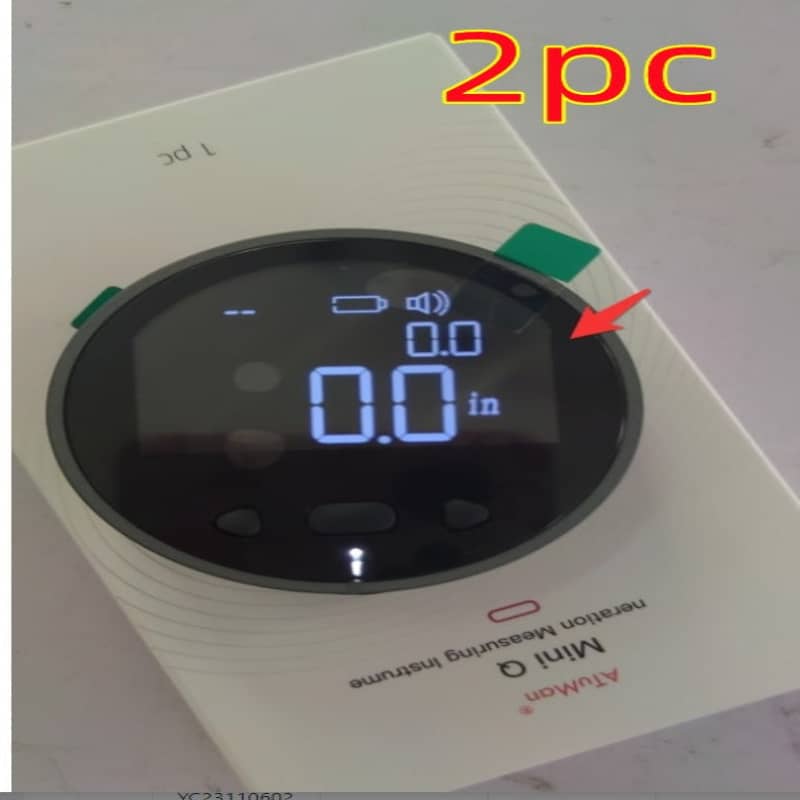 Digital device with a screen displaying '0.0' and labeled '2pc' at the top.