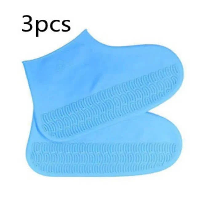 Three blue silicone shoe covers on a white background with '3pcs' text.
