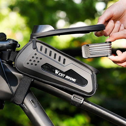 Bicycle tool kit attached to a bike with a blurred green background