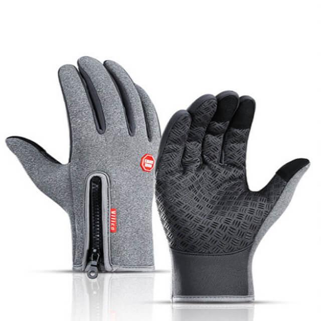 Gray fitness gloves with black non-slip grip and zipper closure, ideal for outdoor workouts
