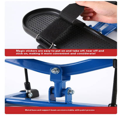 Close-up of adjustable fitness equipment footrest with black strap and blue metal frame.