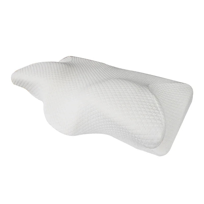 Ergonomic memory foam pillow with contoured design and textured white cover for neck support