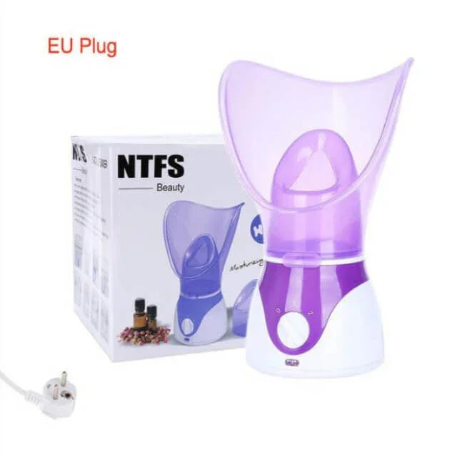 Facial steamer with EU plug, purple and white, shown with box and essential oils.