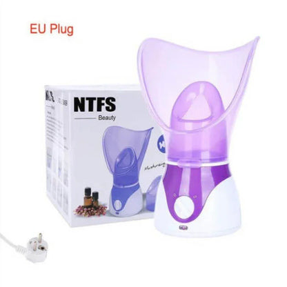 Facial steamer with EU plug, purple and white, shown with box and essential oils.