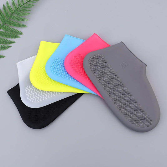 Silicone shoe polish pads in various colors on a gray background