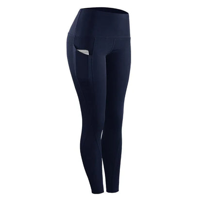 Navy blue high-waisted women's fitness leggings with side pocket holding a phone