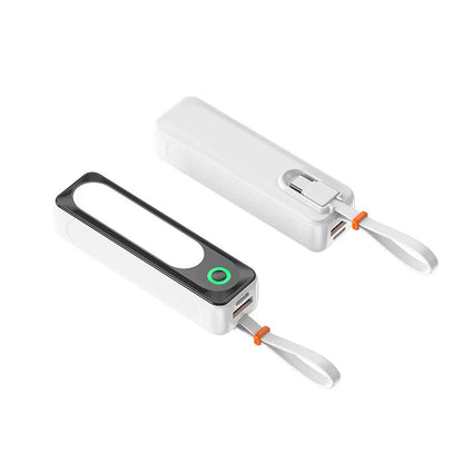 Portable white USB power bank with black accent and carrying strap, compact design