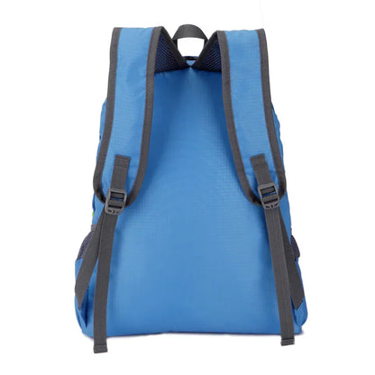 Blue lightweight backpack with adjustable padded shoulder straps, outdoor gear