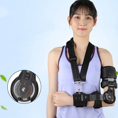 Woman wearing a black arm brace with a blue background