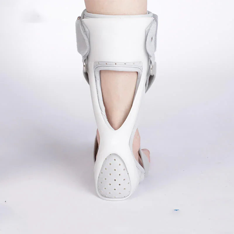 White shoe with a unique design on a white background