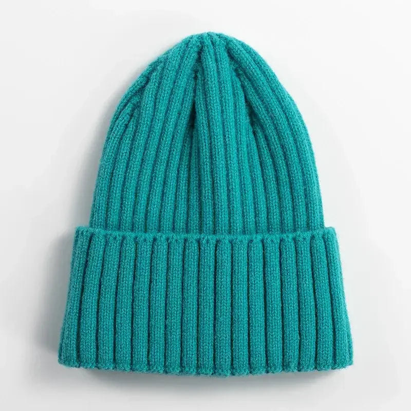 Teal ribbed knit beanie hat for outdoor activities and cold weather protection