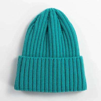 Teal ribbed knit beanie hat for outdoor activities and cold weather protection