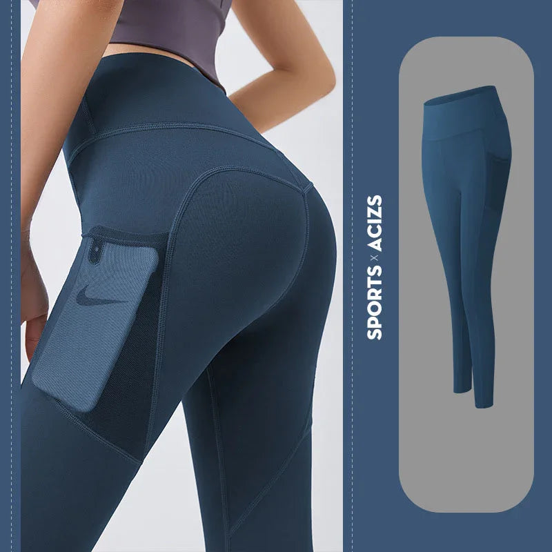 Blue athletic leggings with a pocket and Nike logo, on a light gray background.