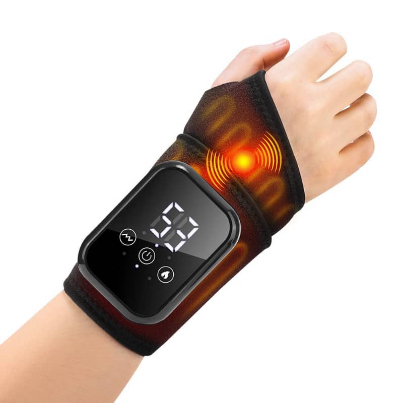 Digital heating pad on a wrist with visible temperature display on a white background