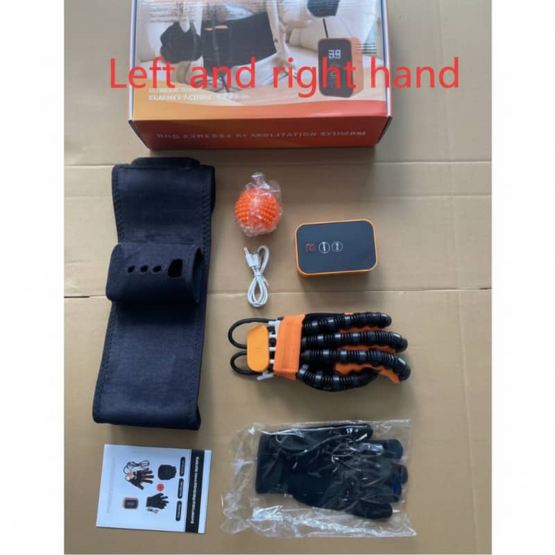 Collection of items including a glove, strap, ball, and packaging on a cardboard surface.