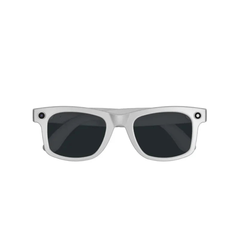 Sunglasses with silver frame and dark lenses on a white background
