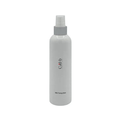 A white spray bottle with a gray pump dispenser and a small red and black logo on the front, labeled 'Mist Spring Elixir'.