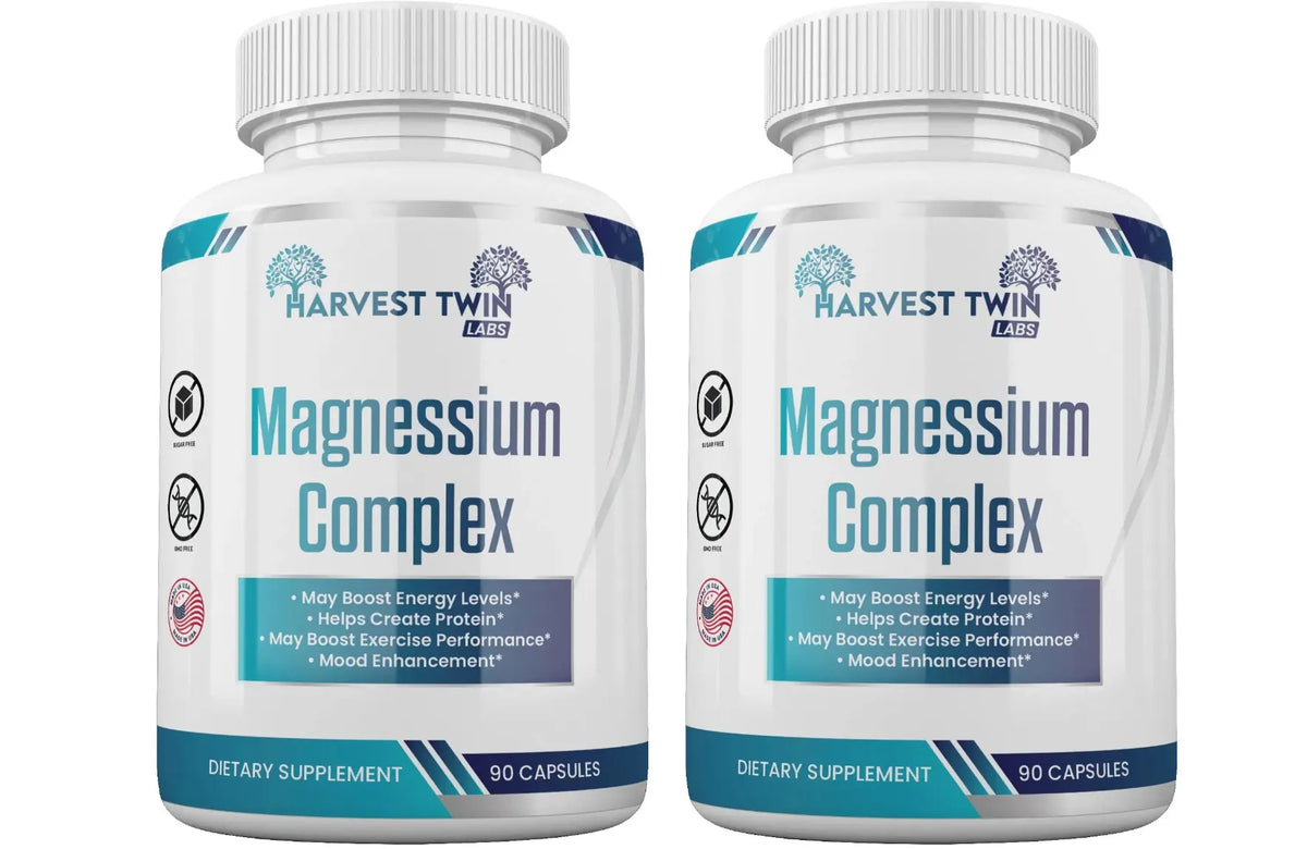 Two white bottles of Harvest Twin Labs Magnesium Complex dietary supplement, side by side on a white background.