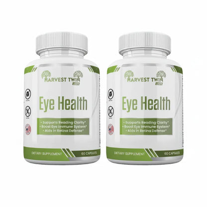 Two white bottles of Harvest Twin Labs Eye Health dietary supplement capsules shown side by side on a plain white background.