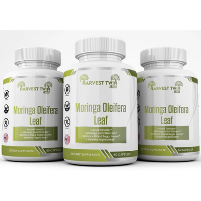 Three white supplement bottles of Harvest Twin Labs Moringa Oleifera Leaf dietary supplement, arranged side by side on a white background.