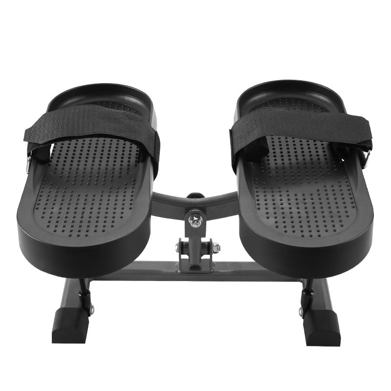 Black foot pedal device on a white background