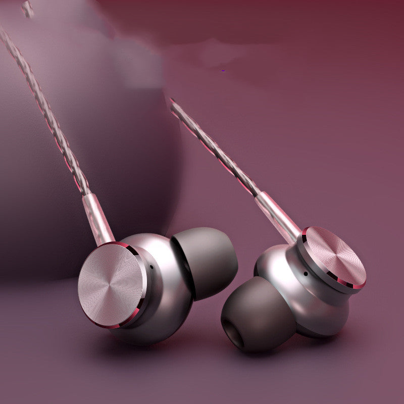 Silver earphones with pink accents on a purple background