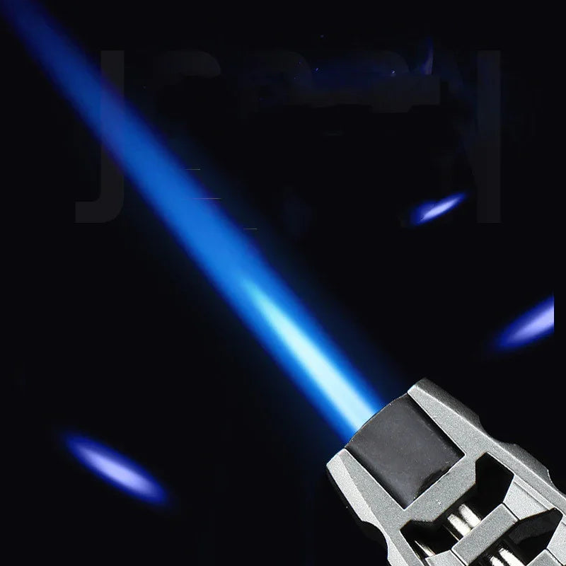 Blue flame from a compact torch lighter on a black background, high precision outdoor gear
