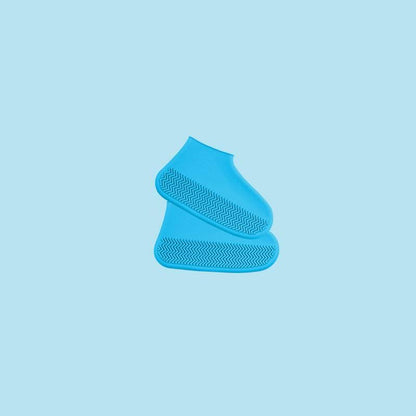 Blue shoe cover on a light blue background