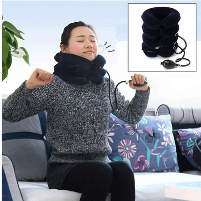 Woman using a black inflatable neck traction device with hand pump for neck pain relief at home