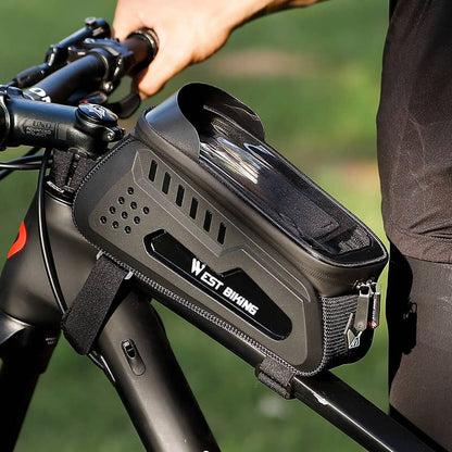 Bicycle handlebar bag with 'West Biking' branding attached to a bike.