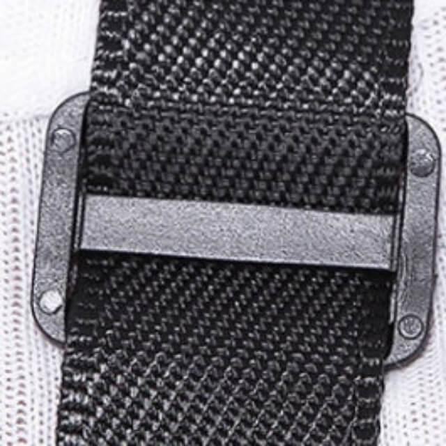 Close-up of a black textured belt with a metal buckle on a white background