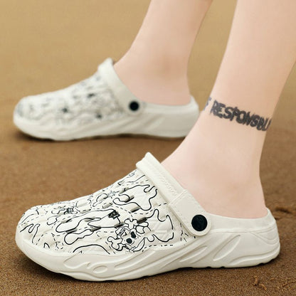 White clogs with black patterns worn on feet against a brown background