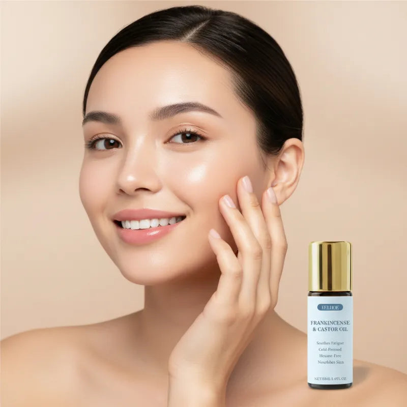 A woman with smooth, radiant skin is shown touching her cheek beside a small bottle of ULISEE Frenchence & Castor Oil.