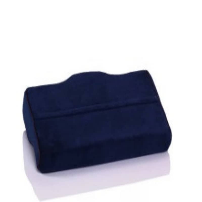 Navy blue pillow on a white background