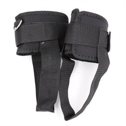 Black wrist support brace with straps on a white background