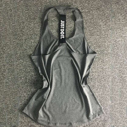Gray tank top with a visible brand logo on a textured surface
