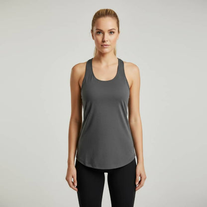 Woman wearing dark grey athletic tank top and black leggings, fitness apparel studio shot